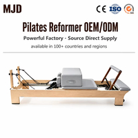 Machine de Pilates Reformer en bois avec barre intégrée, revêtement en cuir personnalisé, logo, équipement de fitness pour studio, directement de l'usine