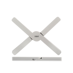 Sottopentola regolabile in silicone di colore grigio chiaro per uso in cucina - Product Image 1