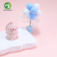 Nouveau tube de baume à lèvres mini mignon en forme de chat rose et bleu avec chaîne, tube cosmétique vide portable en plastique pour vente en gros OEM/ODM