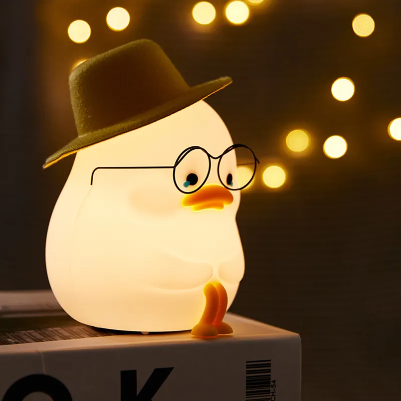 Sevimli Emo ördek silikon gece lambası yumuşak Led silikon gece lambası bebek kreş lamba ile gözlük
