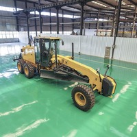 Niveleuse à moteur Shentui 215HP avec moteur Cummins, système entièrement hydraulique de 16,8 tonnes pour la construction routière et les travaux de terrassement