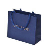 Sacs de shopping en papier enduit recyclable avec logo personnalisé de luxe, poignée en corde de coton, produits ménagers personnalisables