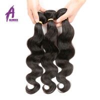 Gros cheveux humains vierges malaisiens stockés, Cheveux humains vierges malaisiens ondulés lâche, vente en gros