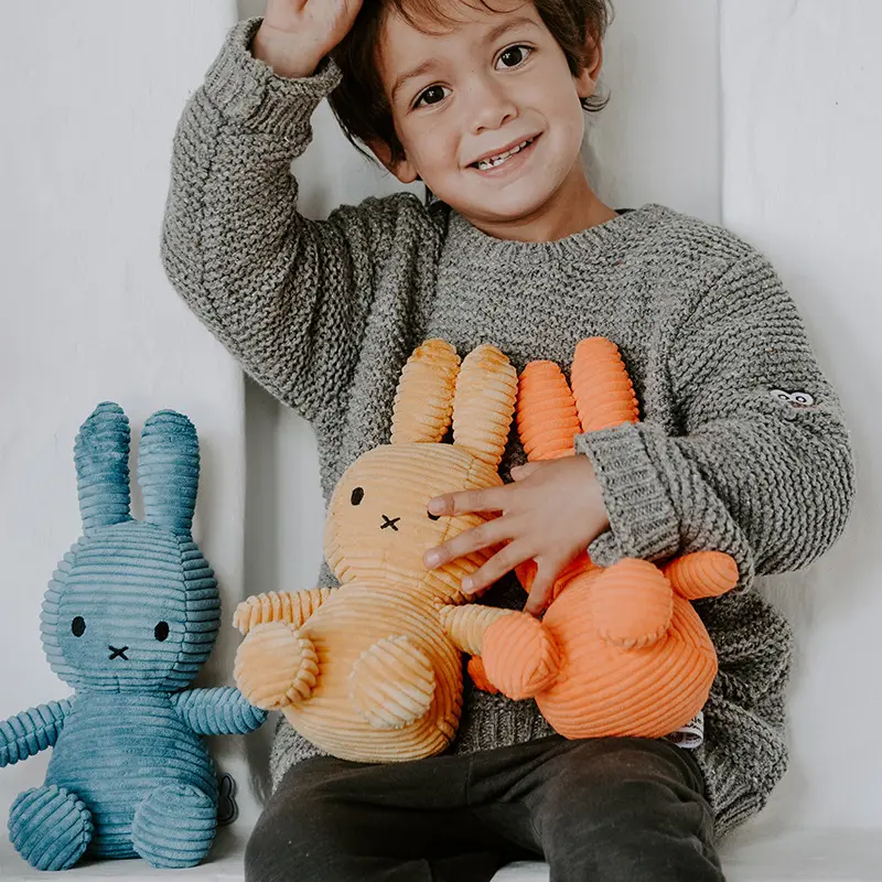 Fabricantes al por mayor dibujos animados lindo conejo Miffi muñeca Anime conejito calmante muñeca buen regalo para niños