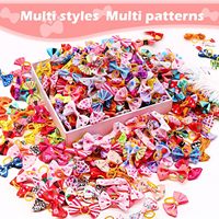 Nœuds pour animaux de compagnie à motifs variés avec élastique, accessoires mignons pour chien et chat en forme de fleur, style aléatoire, accessoires de toilettage pour animaux OEM ODM
