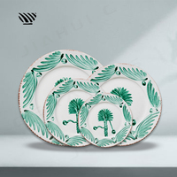 Ensemble d'assiettes en céramique feuille verte artisanale motifs tropicaux peints à la main pour décor de table de mariage magique