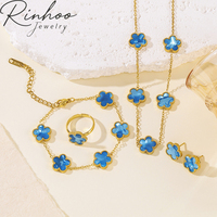 Ensemble de bijoux en acier inoxydable classique plaqué or 18 carats, collier, bracelet, boucles d'oreilles, bagues, motif trèfle à cinq feuilles, pour femme, bijoux de fête