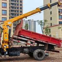 Grue télescopique montée sur camion d'occasion à prix avantageux, 4 tonnes, avec benne basculante pour chantier de construction