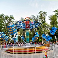 Manège coloré à levage rotatif pour parc d'attractions extérieur, avec tir aérien spectaculaire
