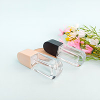 Bouteille en verre ronde transparente vide de 30 ml avec pompe à lotion et impression sérigraphique pour sérum de soin de la peau, logo personnalisé
