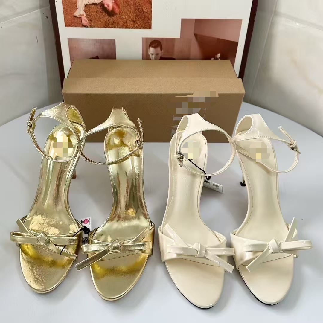 gold dress sandals heels Nine West Women's Maskil Heeled Sandal main image 0