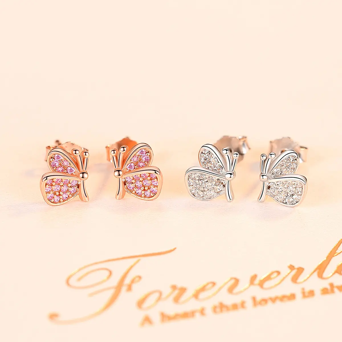 Butterfly earrings  silver needles  S925 silver ear decoration  pink  niche temperament  Korean version  simple and exquisite