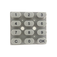 Clavier en silicone flexible personnalisé 3x4 à boutons conducteurs en carbone pour applications d'instruments et de compteurs