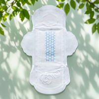 Vente en gros de serviettes hygiéniques ultra-fines jetables en coton biologique avec ailettes et protection anti-fuites Softcare Anion pour femmes Fujian Chine