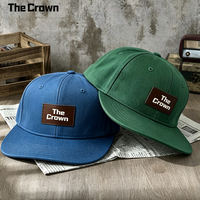 Gorra de mezclilla de 6 paneles con logotipo personalizado, visera plana, diseño floral/con personajes, parche de cuero, cierre trasero ajustable, tela común, venta al por mayor a granel