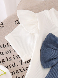 Nouvelle Collection É<span class=keywords><strong>t</strong></span>é Vêtements pour Enfants Ensemble Deux Pièces pour Bébé Fille <span class=keywords><strong>T</strong></span>-<span class=keywords><strong>Shirt</strong></span> <span class=keywords><strong>Blanc</strong></span> Jupe Bleue Coton Manches Courtes Grand Nœud - Product Image 4