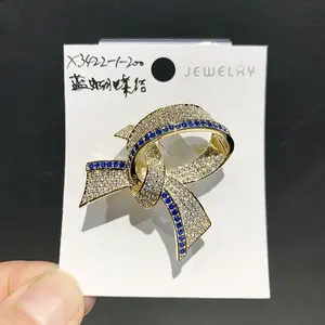 XILIANGFEIZI 개인화 된 럭셔리 타이 배지 구리 지르콘 금도금 나비 매듭 브로치 선물