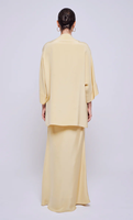 Tenue musulmane 2026 pour l'Aïd/Mariage : Ensemble 2 pièces en satin jaune avec chemisier à col en V orné de perles multicolores et jupe sirène