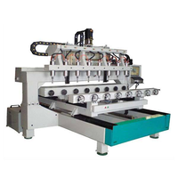 Routeur CNC 3D 4 axes à 8 têtes pour la sculpture sur bois avec système de contrôle DSP, moteur rotatif multi-fils et composants PLC