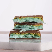 Produit phare et très demandé : Barre chocolatée en forme de cheveux avec garniture saveur barbe à papa, Caramel, Citron, Chocolat - Vente en gros usine