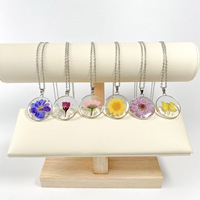 2025 vente chaude Transparent coloré marguerite mode fleur séchée pendentif rond vraie fleur bijoux résine fleur collier