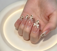 Faux ongles à presser, style français, motif léopard, forme amande, courts, avec nœud perlé, prêts à poser, best-seller transfrontalier