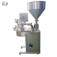 Machine de capsulage de remplissage de poche à bec automatique rotatif de 100ml 250 ml pour liquide de gin amer de 750ml