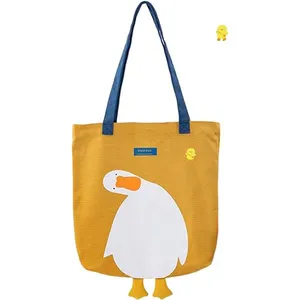 Vente en gros de sac fourre-tout en toile recyclé et réutilisable, mignon canard suspendu, sac à provisions en coton jaune pour femmes avec poche intérieure