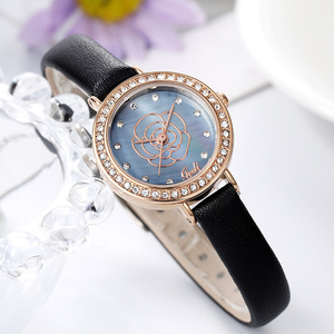 Montre-bracelet pour femme avec cadran serti de diamants, bracelet en cuir rond, tendance et moderne - Product Image 1
