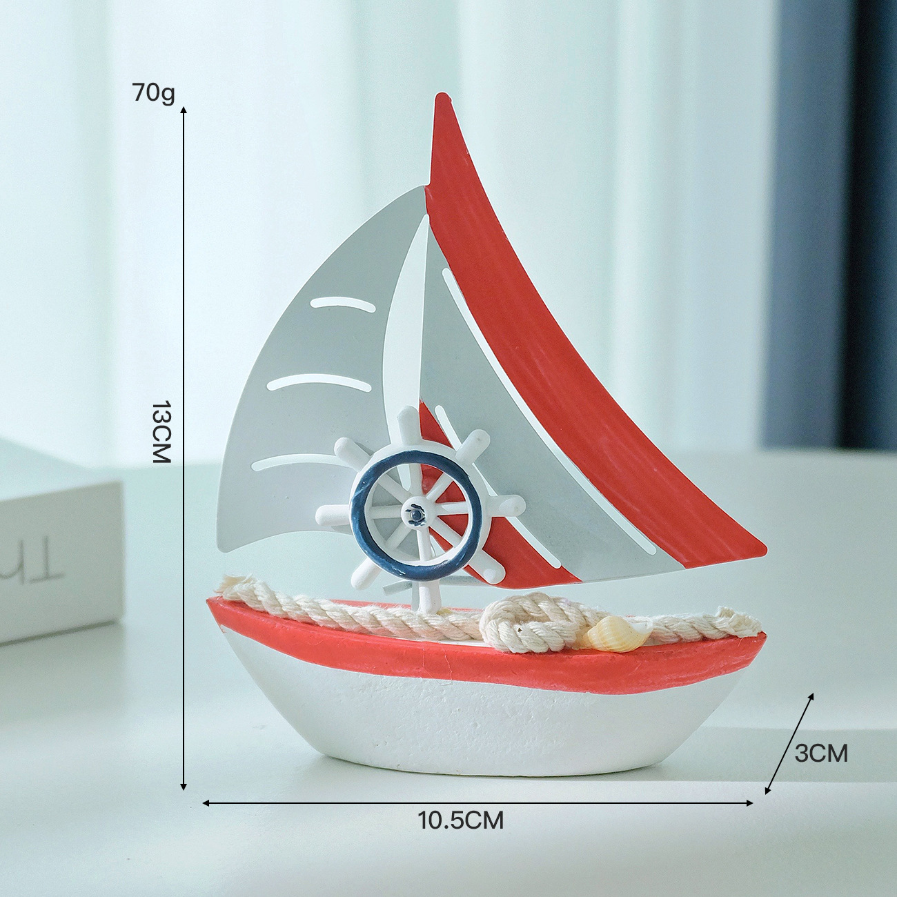 Iron sailboat with red rudder