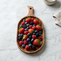 Planche à pagaie ovale en noyer d'Amérique du Sud avec poignée, plateau de service rustique pour la présentation des aliments