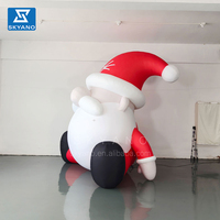 Décoration extérieure gonflable de Noël personnalisé faire sauter énorme grande barbe gonflable assis père noël pour décor de cour