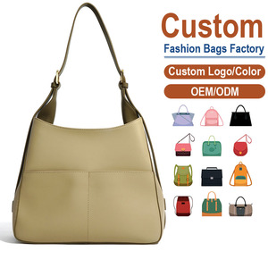 Sac à bandoulière en cuir véritable, design à double panneau, texture fine granulée, finition mate douce, silhouette fluide drapée, personnalisable - Product Image 1