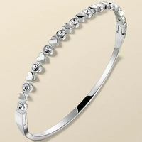 Bracelet en acier inoxydable plaqué or avec zircons étincelants en forme de cœur alternés, style Sweet Love, pour femme, idéal pour le quotidien ou les fêtes