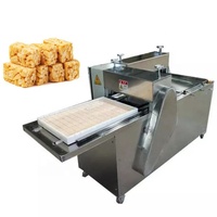 Machine de fabrication de barres protéinées aux céréales, de bonbons aux cacahuètes et de galettes de graines de sésame