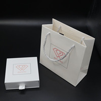 Tiroir en papier avec logo personnalisé haut de gamme Boîte d'emballage pour bijoux Vente en gros Bracelet Bague Collier Ensemble Sérigraphie Revêtement UV