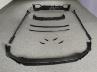 Kit carrosserie Aul Style en fibre de carbone sèche : Lame avant, diffuseur arrière, jupes latérales, aileron arrière, lame de coupe-vent compatible avec Audi RS6