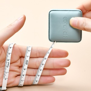 Mini cinta métrica portátil de cuero suave <span class=keywords><strong>para</strong></span> uso doméstico <span class=keywords><strong>para</strong></span> ropa, medidas de cintura de sastre, regla métrica pequeña <span class=keywords><strong>para</strong></span> el hogar - Product Image 1