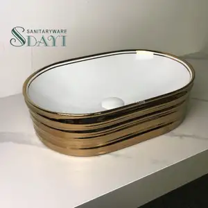 SDAYI Gold Basin Counter Top Porcelain Luxury Golden Ceramic Bathroom Oval Gold Color Face Hand lavabo Wash basin Sink