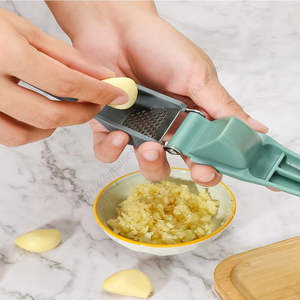 Venta al por mayor de fábrica Syh1351: Picadora y trituradora de acero inoxidable, prensa manual de ajo de cocina de material PP - Product Image 3