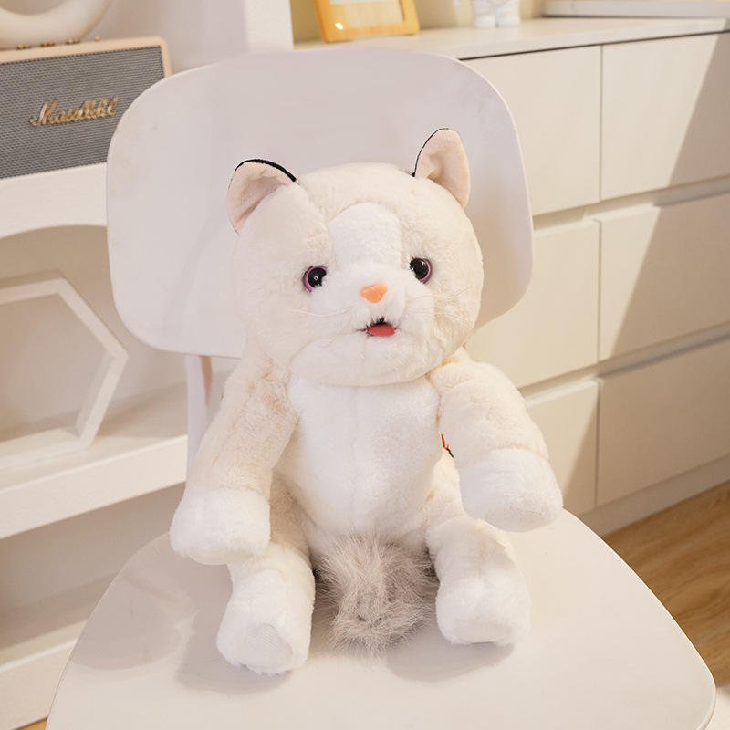 Poupée chat sac à dos léchant la langue chantant pour apprendre à parler