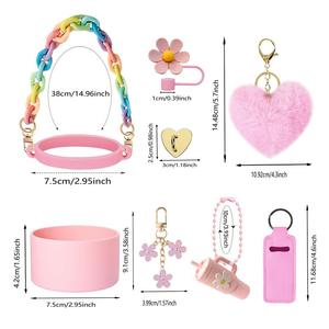 Bộ phụ kiện cho cốc Stanley bao gồm quai cầm chai, nắp đậy ống hút, móc khóa, vỏ son dưỡng môi và móc treo nhỏ. - Product Image 3