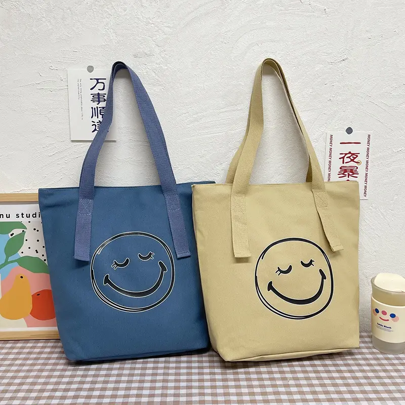 Student canvas bag female simple cute smiling face little female one shoulder Tote bag portable class tutoring bag