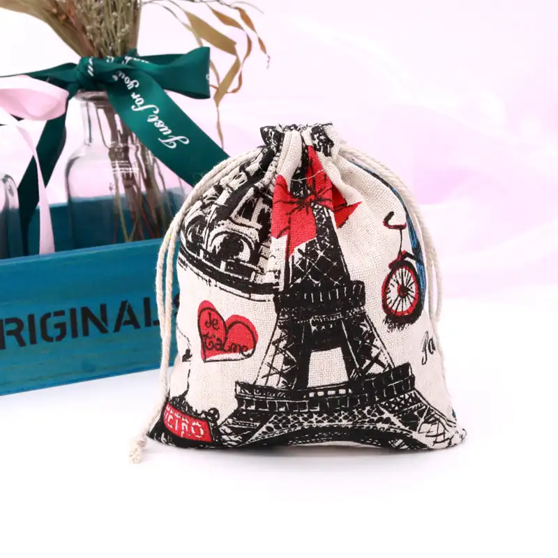 उत्तम 19*24cm उपहार छोटे कपास लिनन कैंडी मुद्रित टॉवर प्यार Drawstring गहने भंडारण बैग