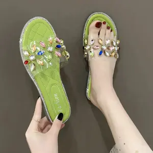 Zapatos planos con diamantes de imitación coloridos de neón, sandalias deslizantes de PVC transparentes de gelatina, sandalias a la moda con flores para exteriores, venta al por mayor, 2022