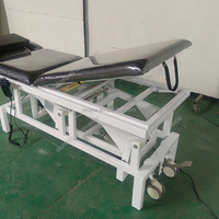 Table de massage élévatrice électrique de bonne qualité Table de physiothérapie portable à vendre