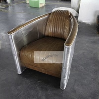 Fauteuil de salon d'hôtel personnalisé en aluminium et cuir marron, design contemporain pour appartement, chambre et restaurant
