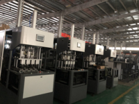 Machine de soufflage par injection semi-automatique à grande vitesse à 4 cavités |   1700BPH |   Moteur PLC |   Certifié CE |   Garantie d'un an