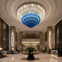 Lustre en cristal de designer, coquille ovale en verre transparent, gouttes bleues, luxe pour projets d'intérieur de maisons et d'hôtels, vente en gros, sur mesure