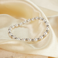 Bracelet en perles élastique, design perlé en acier inoxydable, bijoux élégants pour femmes à porter au quotidien